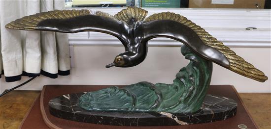 An Art Deco bronzed metal seagull, signed M - Leducq